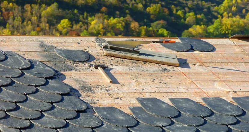 Roofing tools on a slate roof under construction